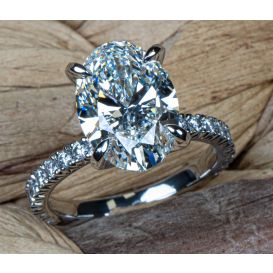 Handmade Platinum Ring with Oval Center and Diamond Accents