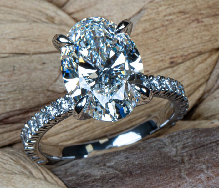Handmade Platinum Ring with Oval Center and Diamond Accents