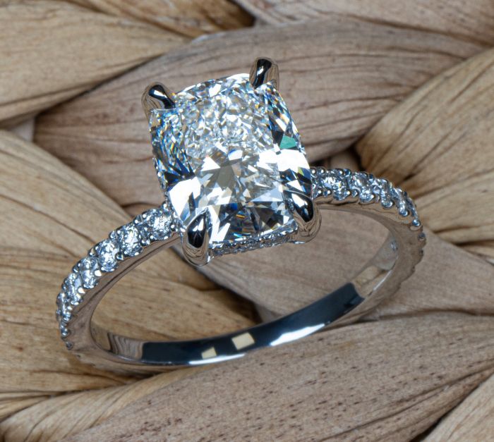 Platinum Handmade Ring with Cushion Center and Diamond Accents